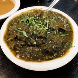 Goat Saag Curry (Free Naan)